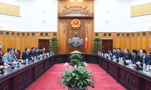 Thủ tướng Nguyễn Xuân Phúc tiếp Phó Thủ tướng, Bộ trưởng Tài chính Lào